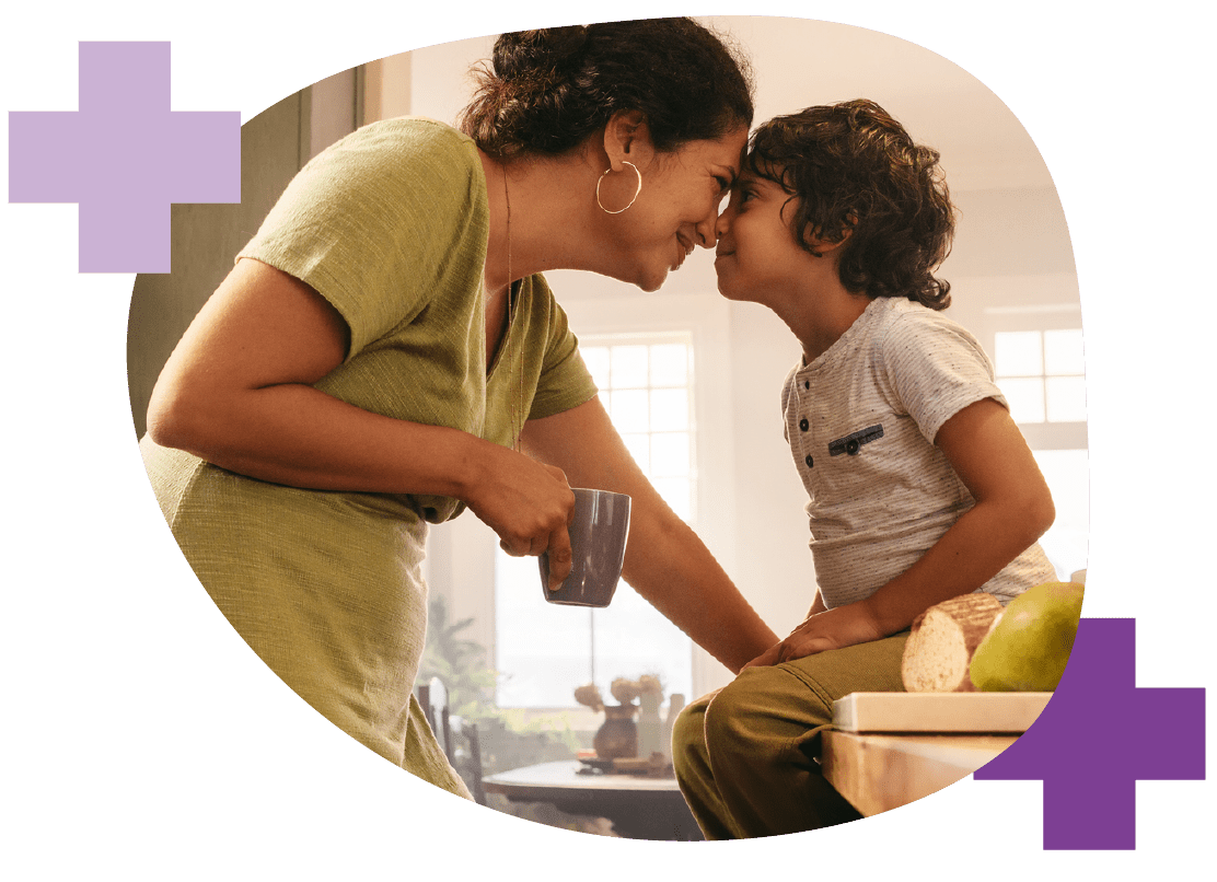 Mother and Daughter Looking at Each other | Compare Family Health Insurance Plans